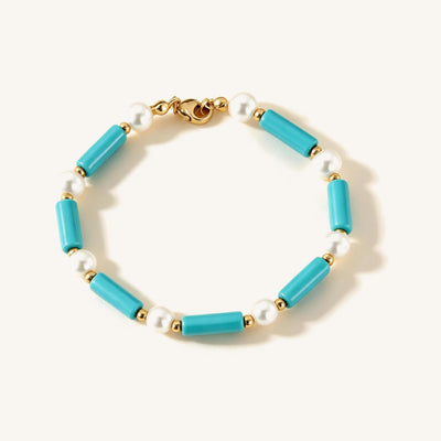 Sky Turquoise & Pearl Bracelet — Turquoise tube beads and white pearls, strung on gold-tone metal (main view)