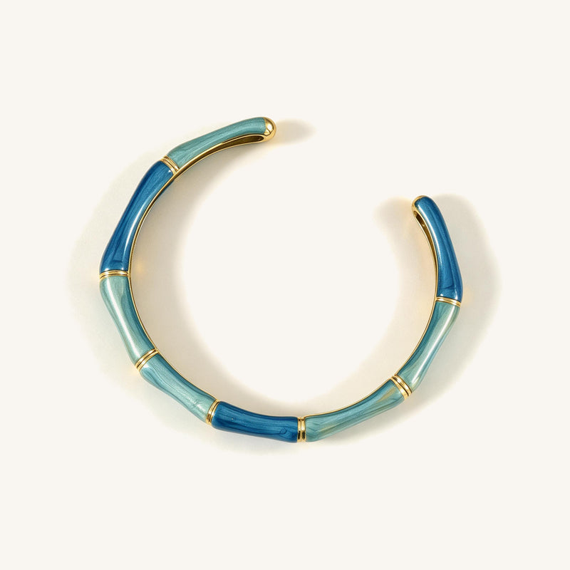 Bamboo Grove Cuff — Blue-green bamboo-link cuff with gold-tone accents (main view)