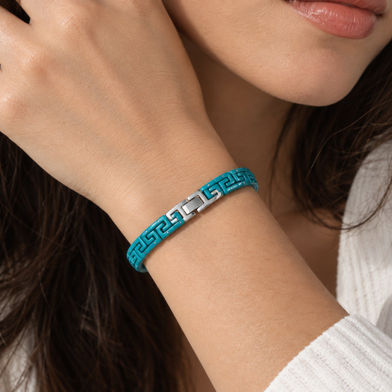 Greek Key Enamel Bracelet — Blue-green enamel links with Greek key motif and a silver-tone clasp (close-up detail)