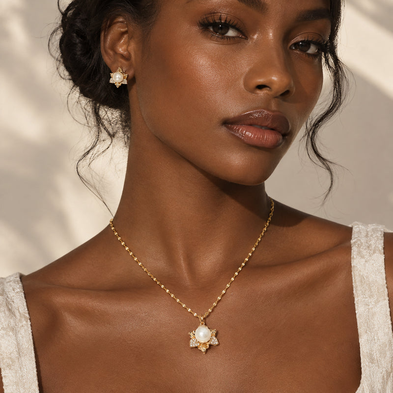 Petal Pearl Necklace — Flower-shaped pendant with a pearl center and crystal-set petals (alternate view)