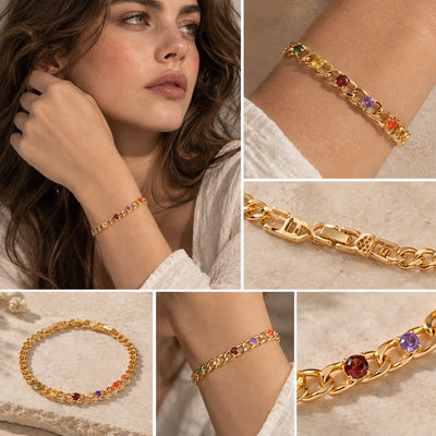 Rainbow Link Bracelet — Chunky gold-tone links with rainbow crystal accents (styled on model)