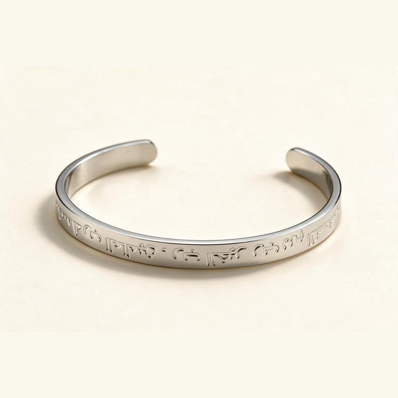 Inscribed Silver Cuff — Silver-tone wide cuff with engraved lettering (styled on model)