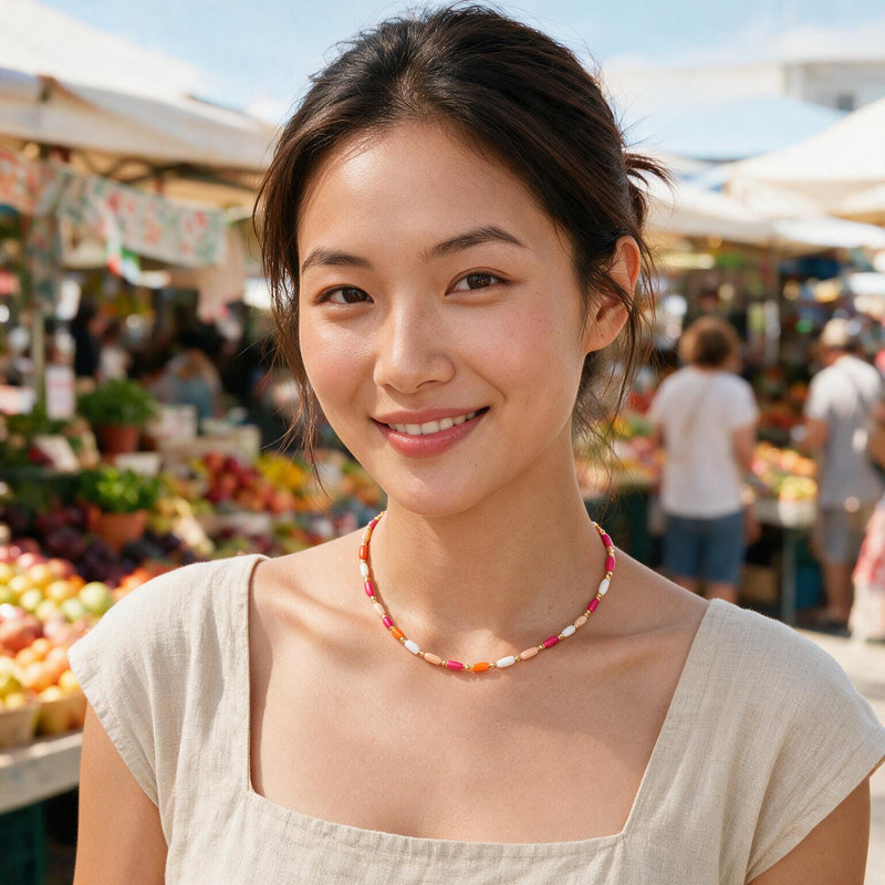 Candy Coral Tube Necklace — Candy-toned coral and shell tube beads with gold-tone beads (alternate view)