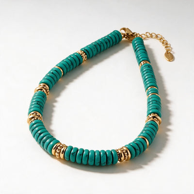 Laguna Bead Necklace — Blue-green flat stone beads with gold-tone spacers (styled on model)